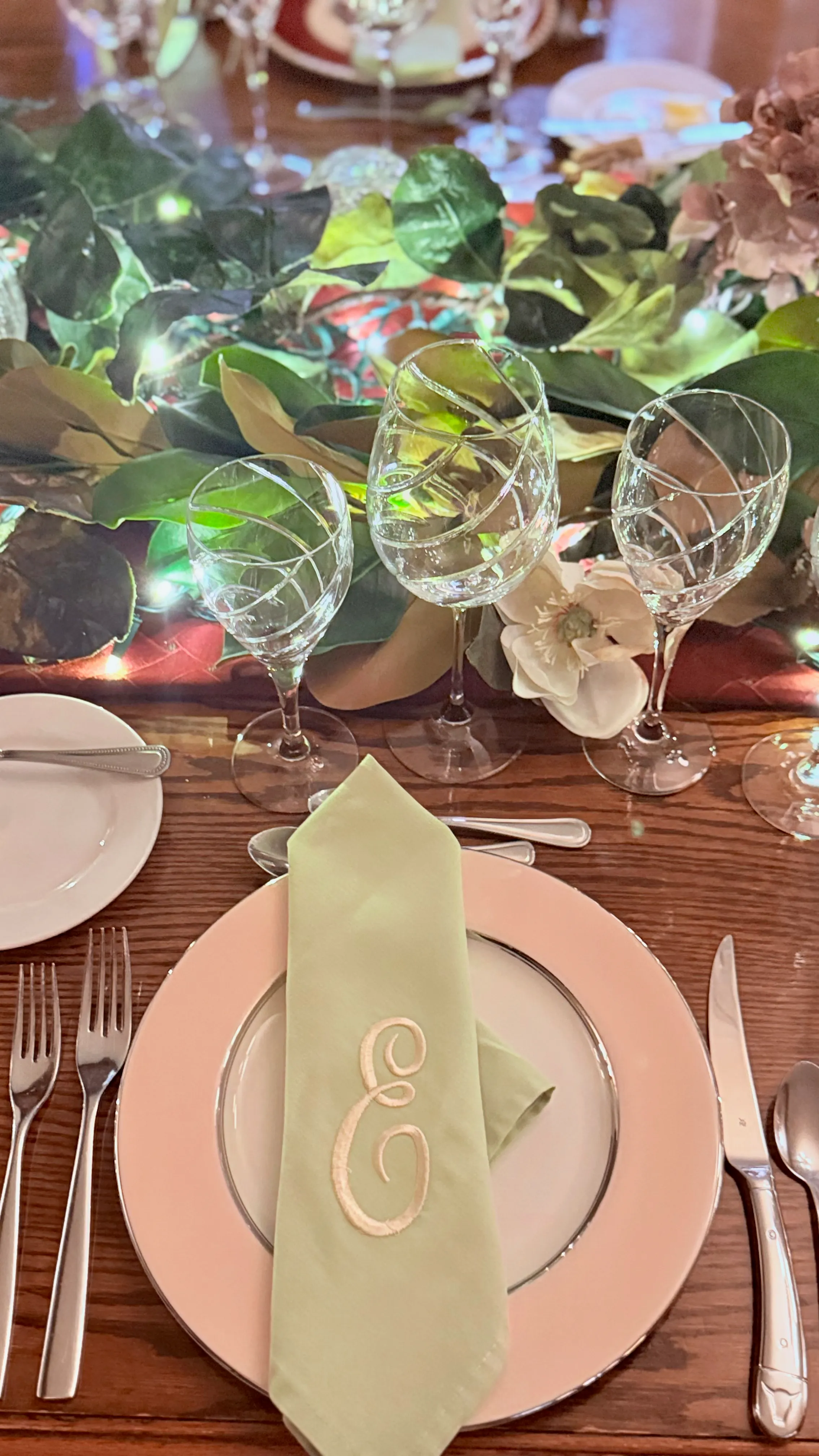 Elegant place setting with monogrammed napkin for a private dinner